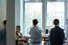 Expert dietitians collaborating in office